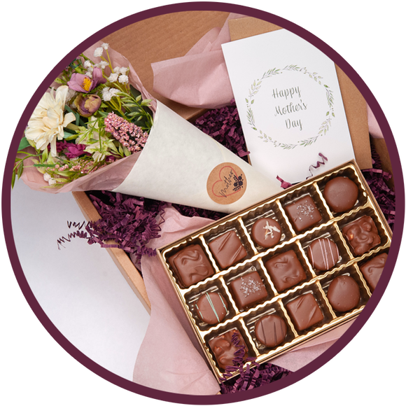 A handmade chocolate collection and flowers gift box for mothers day.