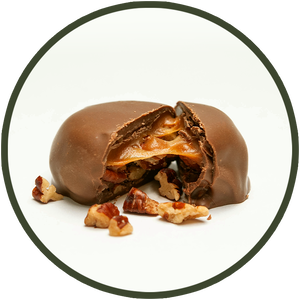 Freshly cooked caramel with salted pecans covered in dark chocolate