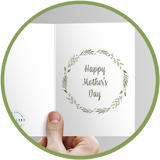 Happy mothers day card with greenery and leaves.