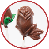 Molded solid milk chocolate rose lollipop.
