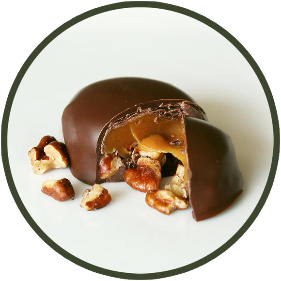 Freshly cooked caramel with salted pecans covered in dark chocolate