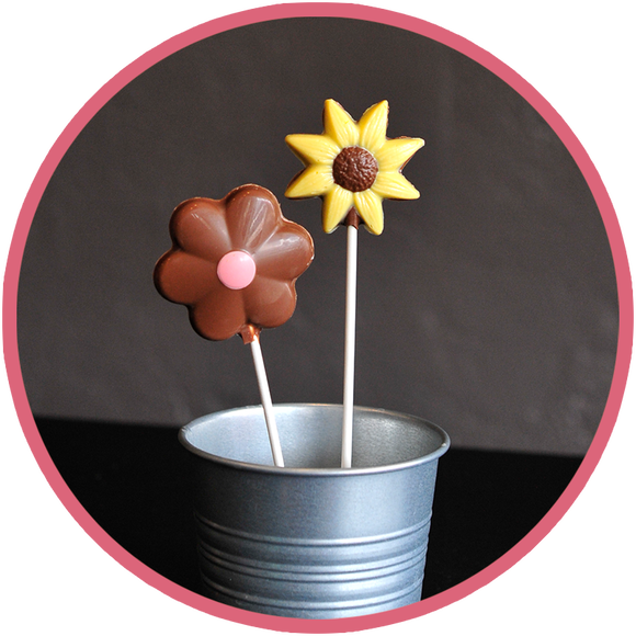 Chocolate flowers and chocolate butterfly lollipops for kids! They make cute summer gifts for kids and are made in Kalona, Iowa.