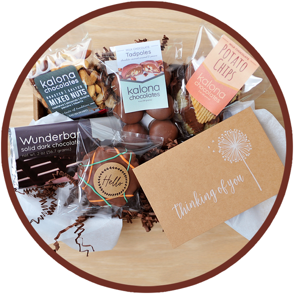 The small Just Because gift box includes a thinking of you card and handmade chocolates from Kalona, Iowa.