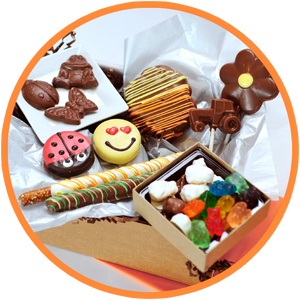 These chocolate gift boxes are made just for kids! They includes fun chocolates that any child will enjoy and are handmade in Kalona Iowa. 