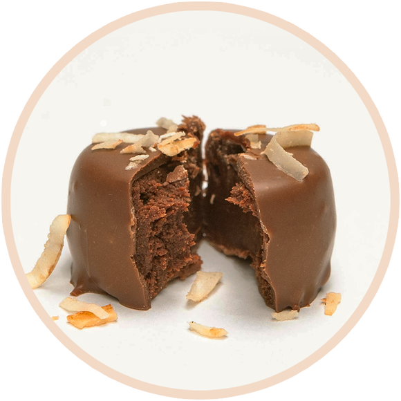Chocolate and coconut flavored truffles, topped with coconut flakes by Kalona Chocolates - specialty treats made in Iowa.