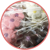 Chocolate flowers to plant a flower using oreo cookie dirt and a gummy worm. Instructions online! Pink flowers, yellow flowers, and purple flowers are available.