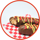 These corn dogs are Krispie treats covered in chocolate. They are sure to make a great gift for anyone missing the fair this year.