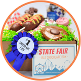 Every chocolate fair box comes with a blue ribbon and state fair fun fact. 